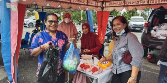 
					Pasar murah merdeka di Kabupaten Jayapura.