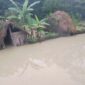 Honai warga di Kampung Pumo, Distrik Silo Karno Doga, Kabupaten Jayawijaya terendam banjir. (KabarPapua.co/Stefanus Tarsi)