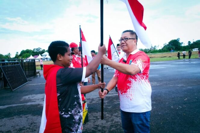 
					Pencangan pengibaran 10 juta bendera  Merah Putih di Provinsi Papua Tengah. Foto: Humas PPT