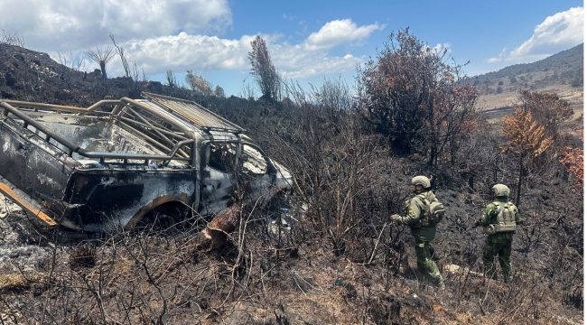 Mobil lajuran Wamena-Mbua dan sopirnya yang dibakar OPM Ndugama. Foto: Satgas TNI Habema 